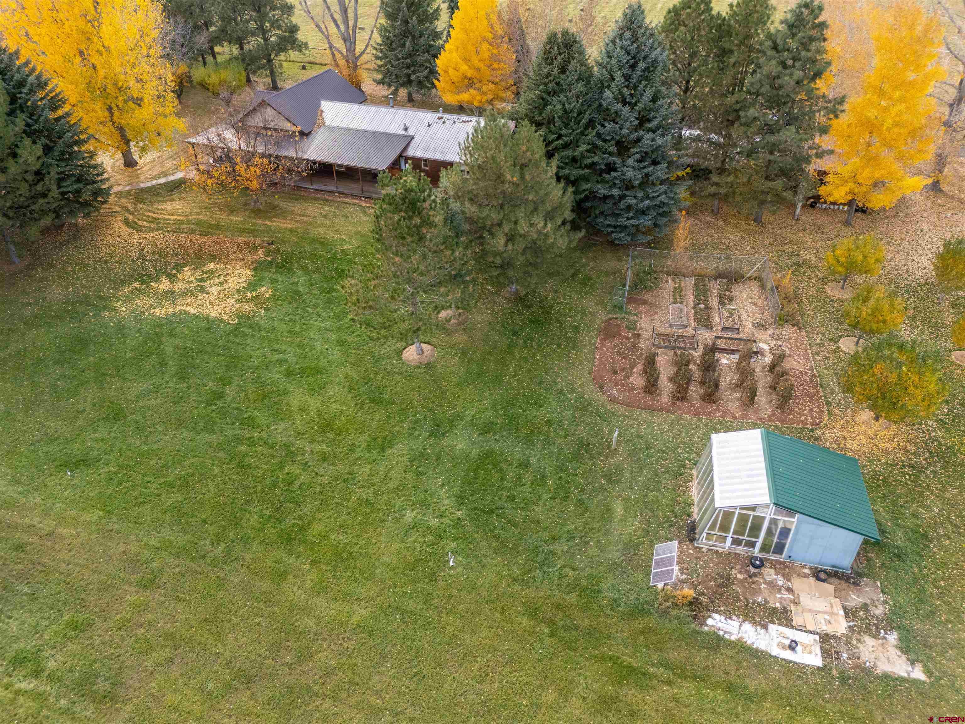 24620 Rd North Cortez, CO 81321 - Photo 34 of 40 a swimming pool with some trees in the background