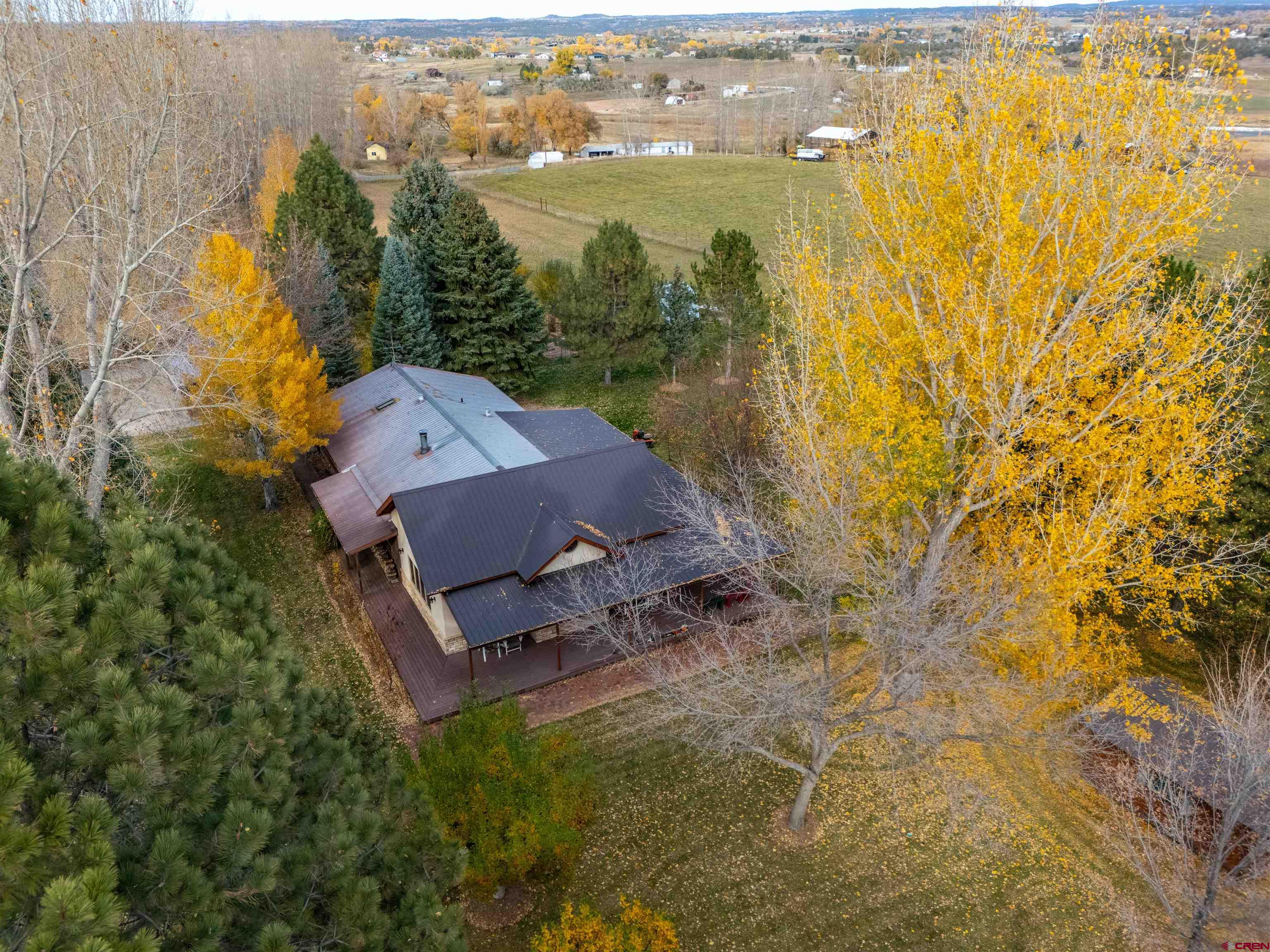 24620 Rd North Cortez, CO 81321 - Photo 10 of 40 an aerial view of residential houses with outdoor space and swimming pool