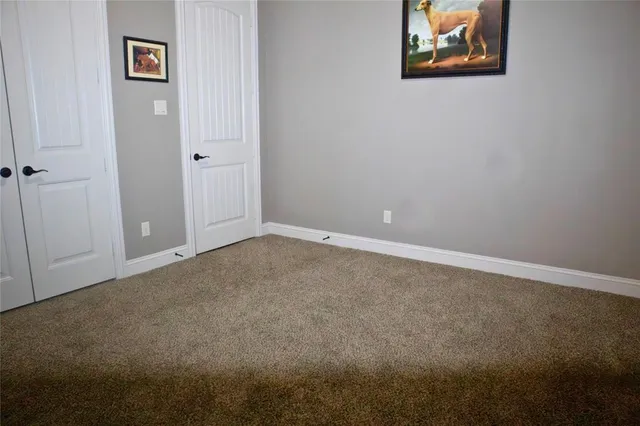 an empty room with a hallway