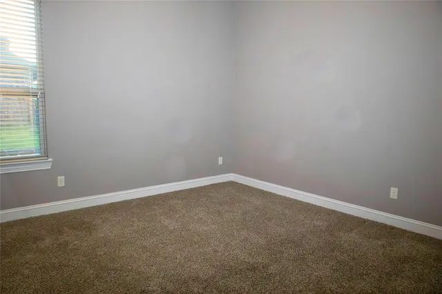 an empty room with closet