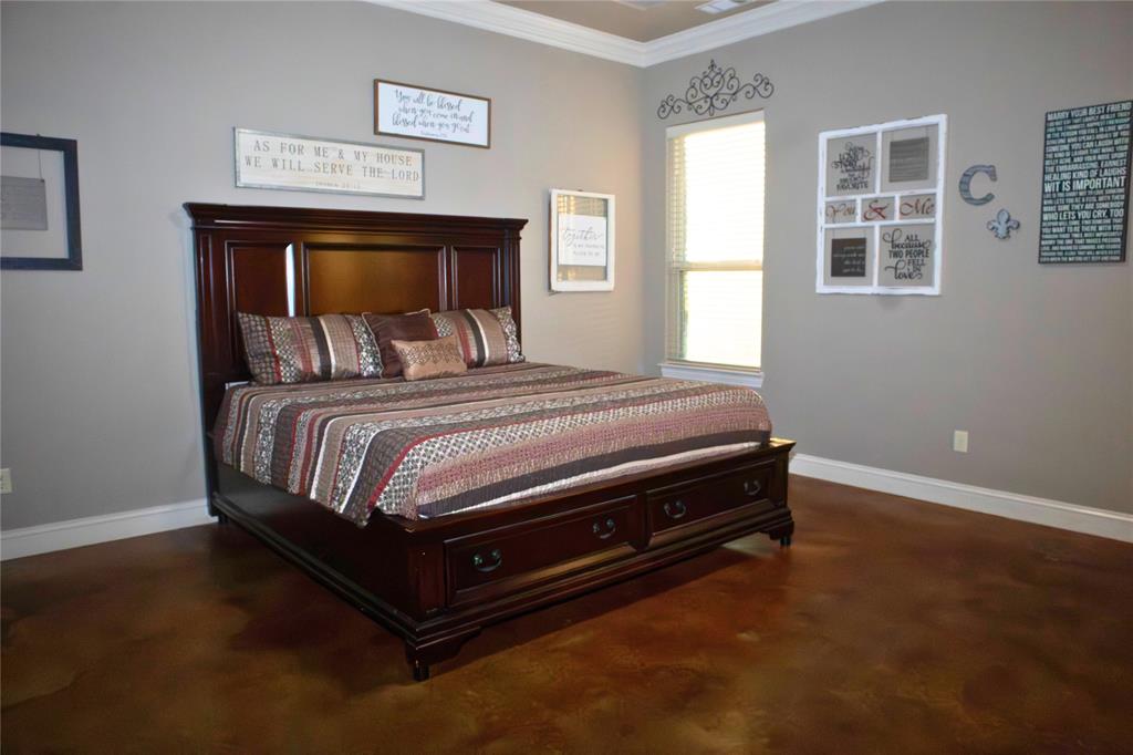7115 Sussex Lane Mansfield, TX 76063 - Photo 9 of 25 a bedroom with a bed and a window