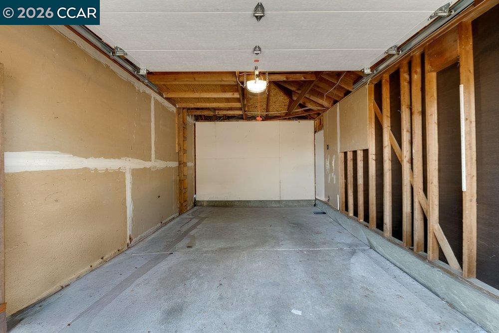 1123 Chadwick Circle Bay Point, CA 94565 - Photo 23 of 26 a view of a garage with stairs
