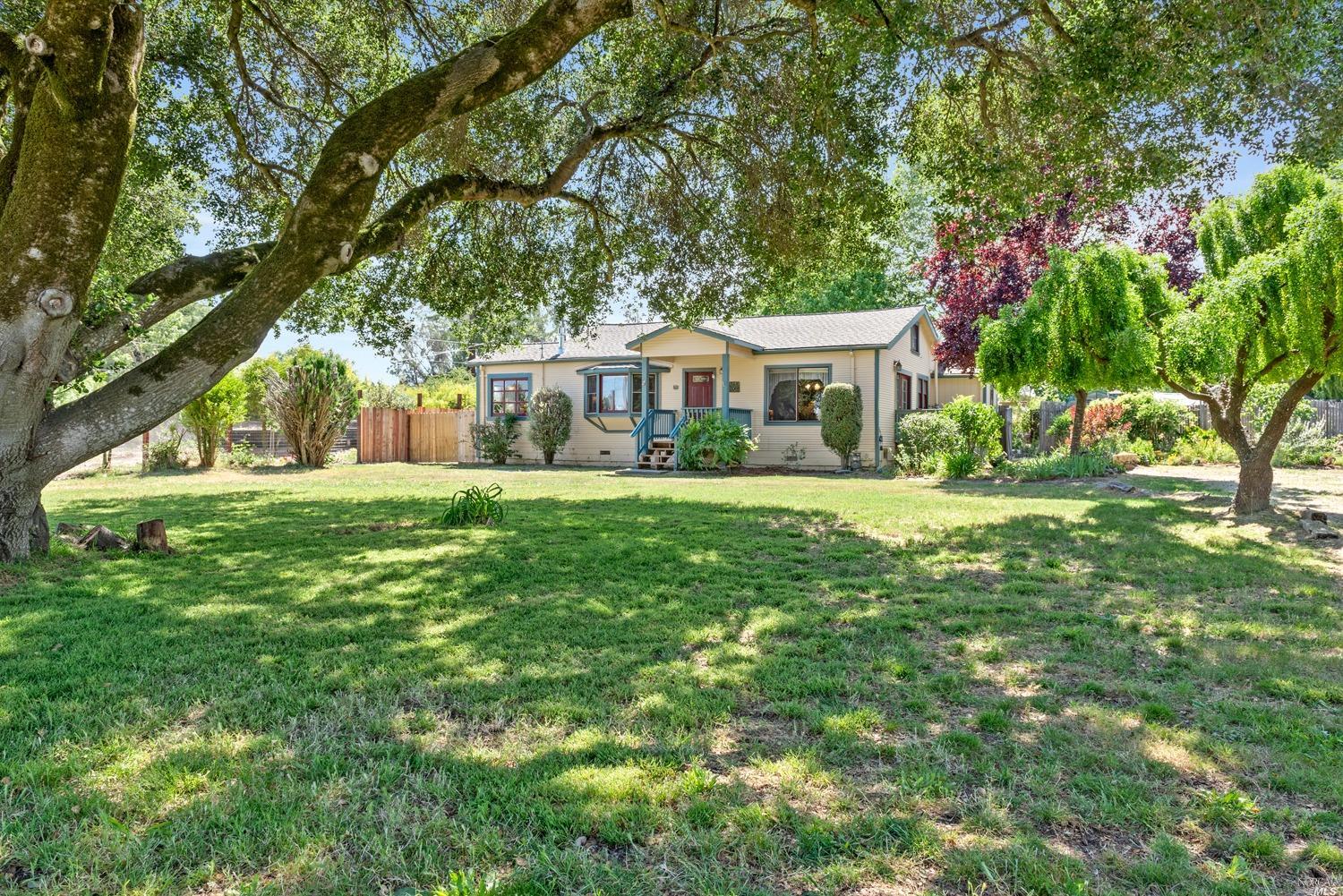 4458 Daywalt Road Sebastopol, CA 95472 - Photo 1 of 1 a front view of house with yard and green space