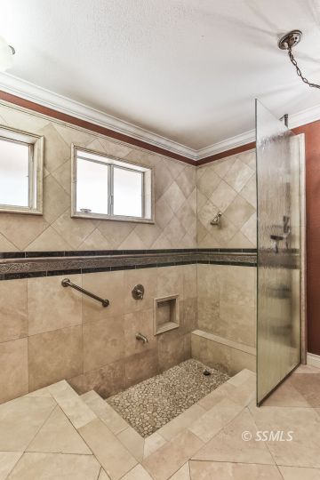 1509 Welcome Way Ridgecrest, CA 93555 - Photo 35 of 50 a bathroom with a bathtub and shower