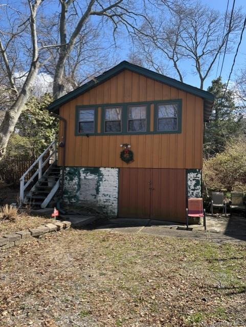 40 Hawthorne Road Rocky Point, NY 11778 - Photo 5 of 19 a front view of a house