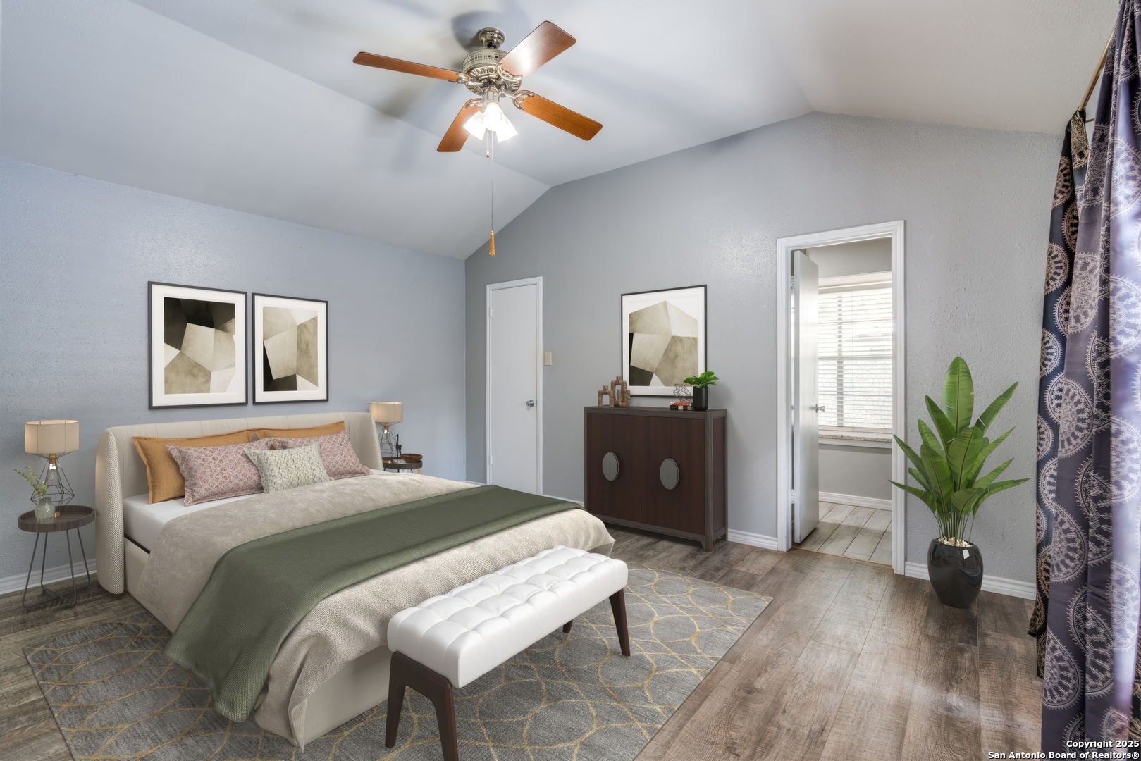 8009 Forest Ash Live Oak, TX 78233 - Photo 15 of 33 a bedroom with a bed and a chandelier