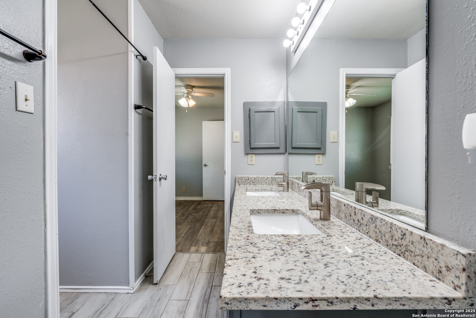 8009 Forest Ash Live Oak, TX 78233 - Photo 29 of 33 a living room with furniture and a rug