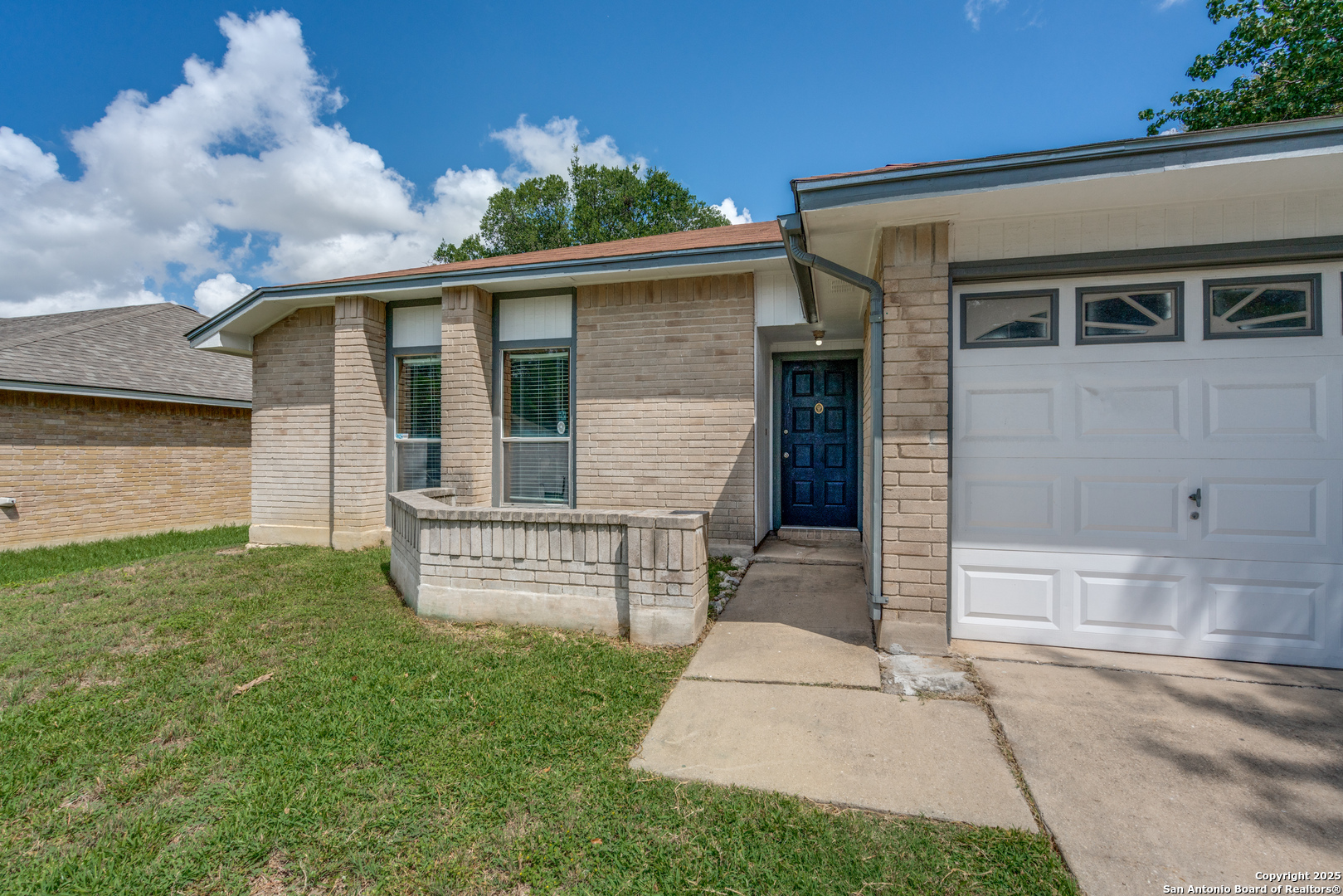 8009 Forest Ash Live Oak, TX 78233 - Photo 3 of 33 front view of house with a yard