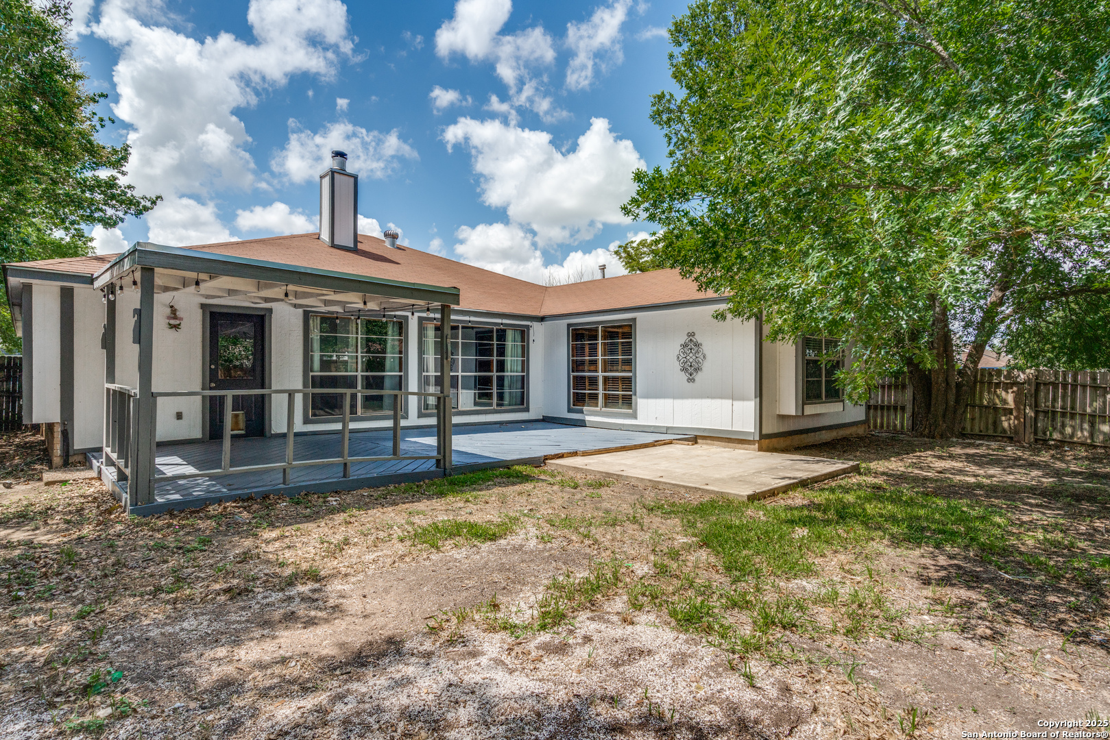 8009 Forest Ash Live Oak, TX 78233 - Photo 33 of 33 a view of a house with a yard and large tree