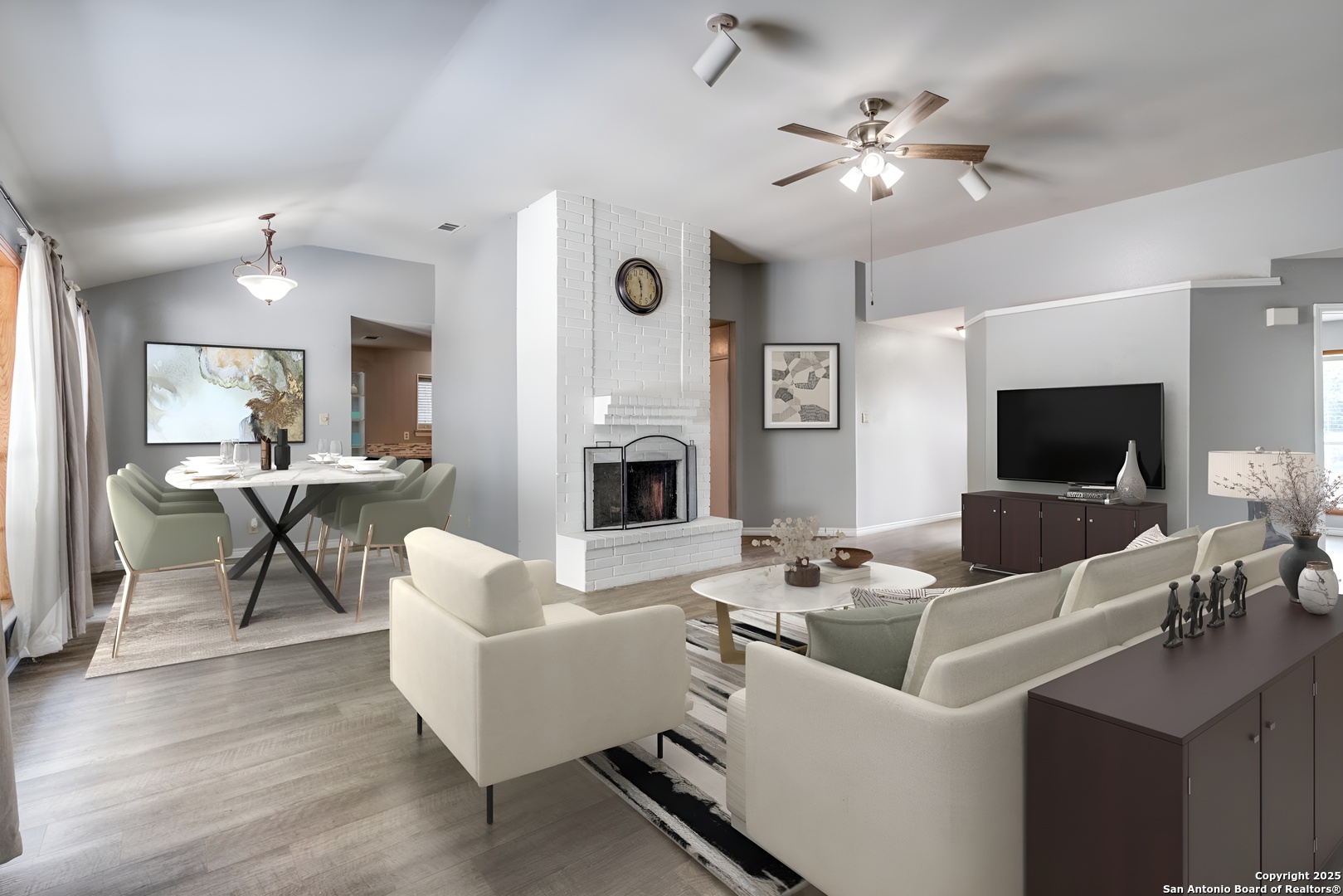 8009 Forest Ash Live Oak, TX 78233 - Photo 4 of 33 a living room with furniture a fireplace and a flat screen tv