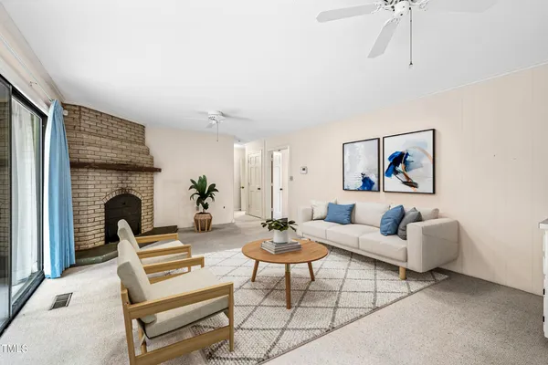 a bed room with a bed and a chair