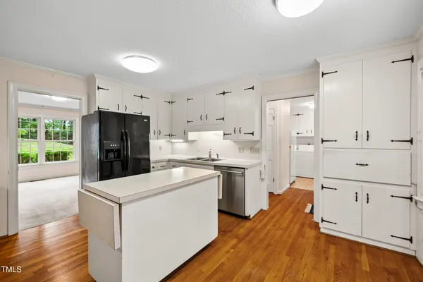 a bathroom with a toilet a sink and a mirror