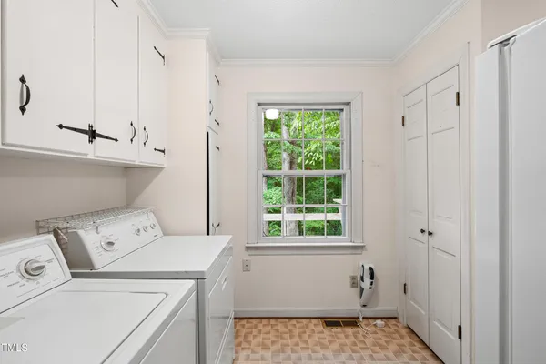a view of a deck with table and chairs and wooden floor