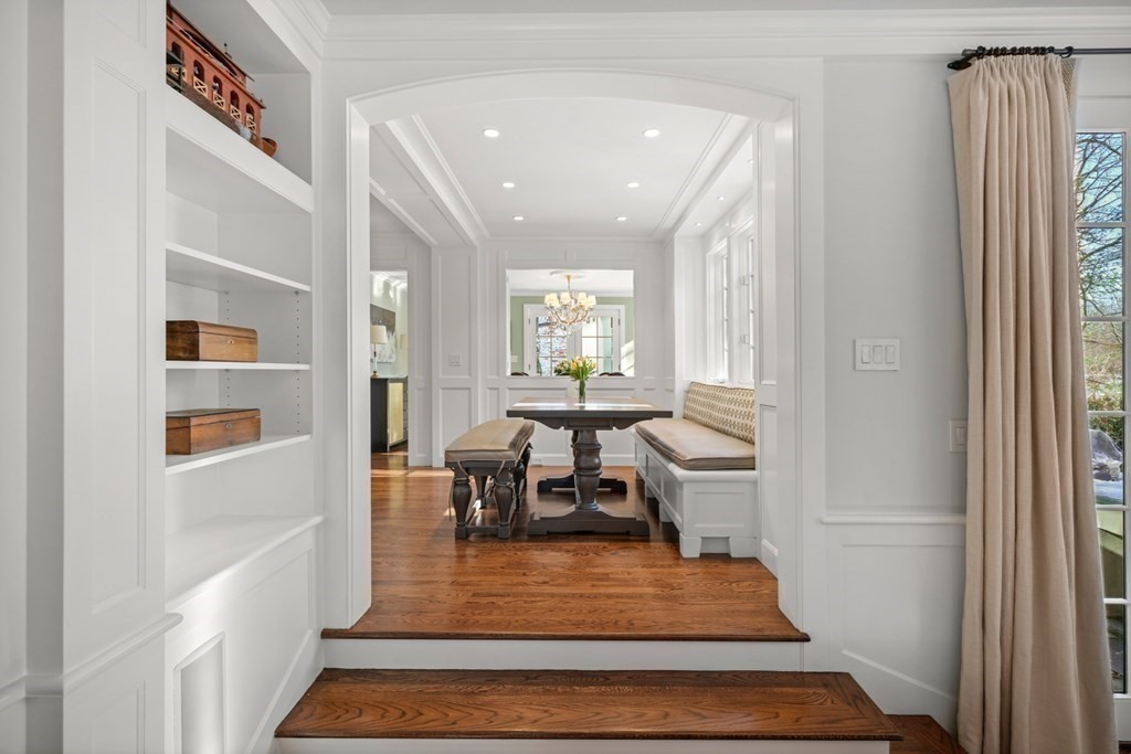 89 Ledgeways Wellesley, MA 02481 - Photo 16 of 42 a living room with furniture and a fireplace