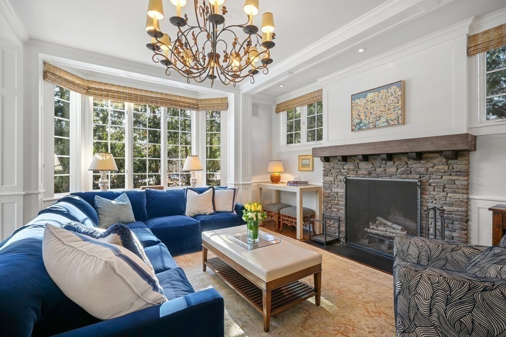 89 Ledgeways Wellesley, MA 02481 - Photo 18 of 42 a living room with furniture and a fireplace