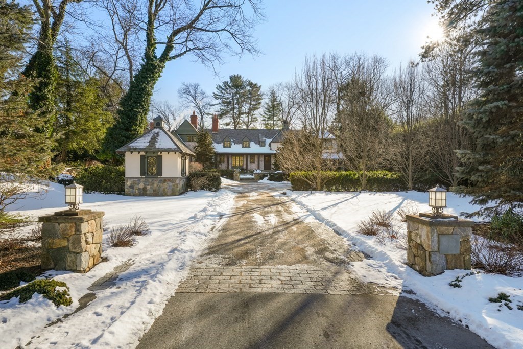 89 Ledgeways Wellesley, MA 02481 - Photo 2 of 42 a view of large house with a yard covered in snow