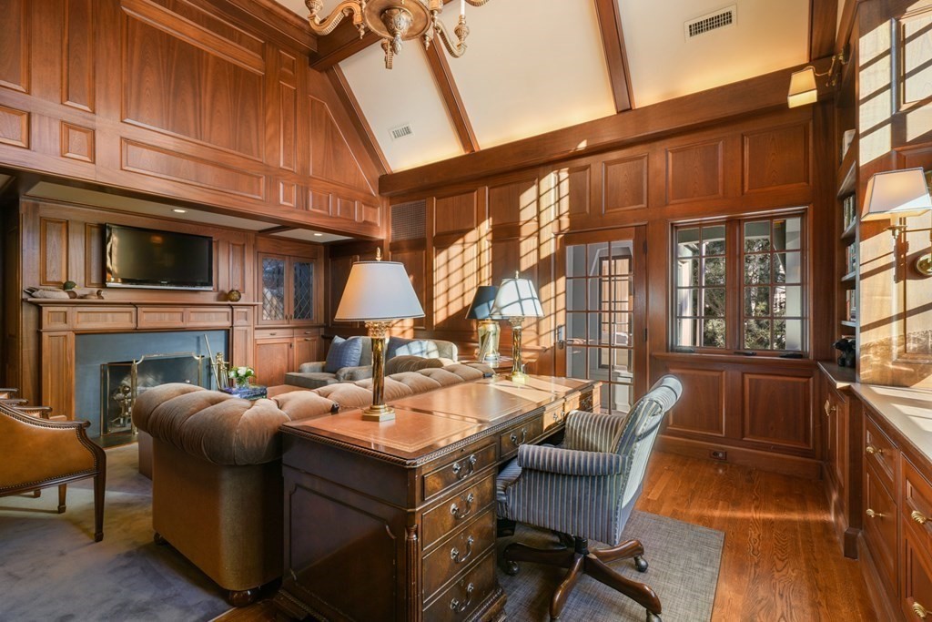 89 Ledgeways Wellesley, MA 02481 - Photo 23 of 42 a view of a patio with a table and chairs