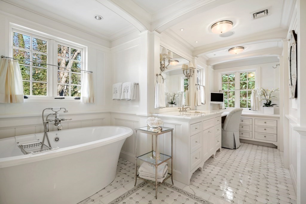 89 Ledgeways Wellesley, MA 02481 - Photo 27 of 42 a large white bathroom with a large tub sink vanity granite and a granite counter tops