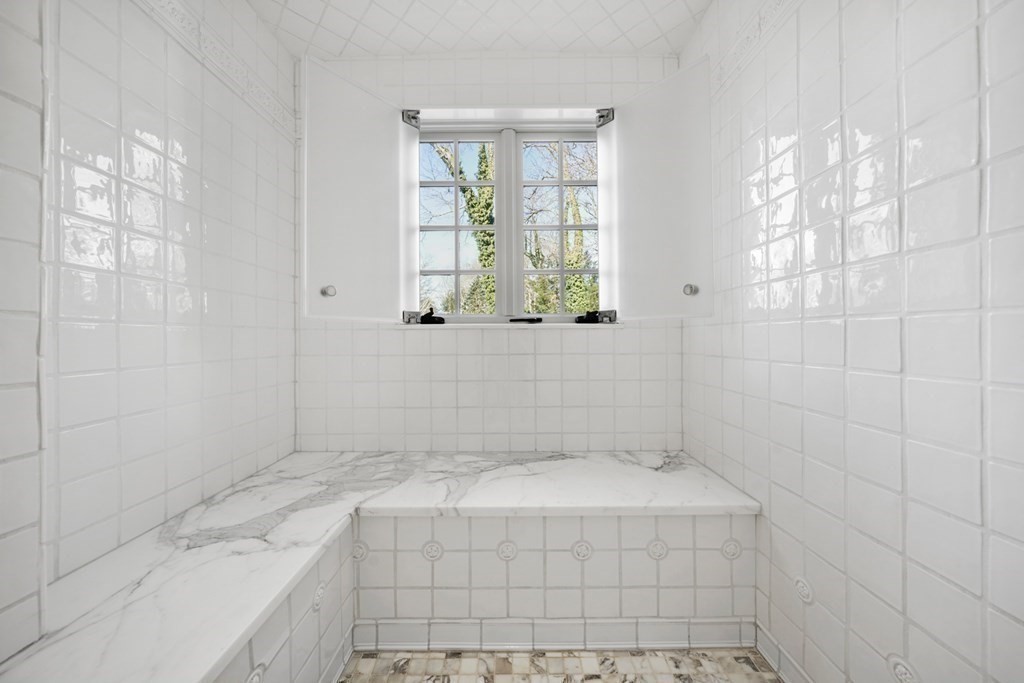 89 Ledgeways Wellesley, MA 02481 - Photo 29 of 42 a bathroom with a bathtub and shower