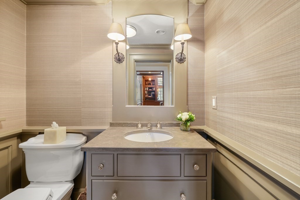 89 Ledgeways Wellesley, MA 02481 - Photo 31 of 42 a bathroom with a sink and a toilet