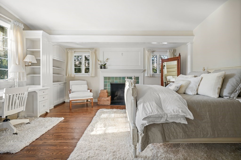 89 Ledgeways Wellesley, MA 02481 - Photo 33 of 42 a living room with furniture and a fireplace