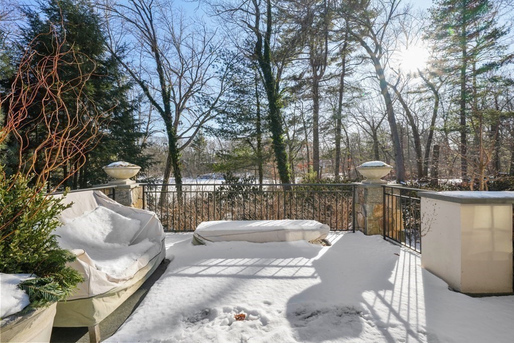 89 Ledgeways Wellesley, MA 02481 - Photo 39 of 42 a view of a patio with couches next to a yard