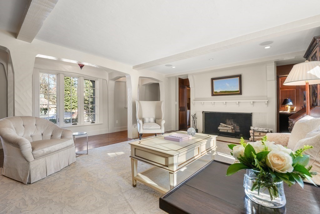 89 Ledgeways Wellesley, MA 02481 - Photo 8 of 42 a living room with furniture and a fireplace