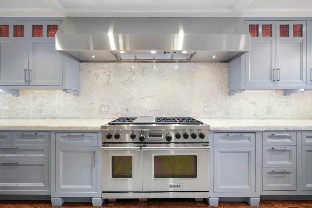 89 Ledgeways Wellesley, MA 02481 - Photo 10 of 42 a stove top oven sitting inside of a kitchen