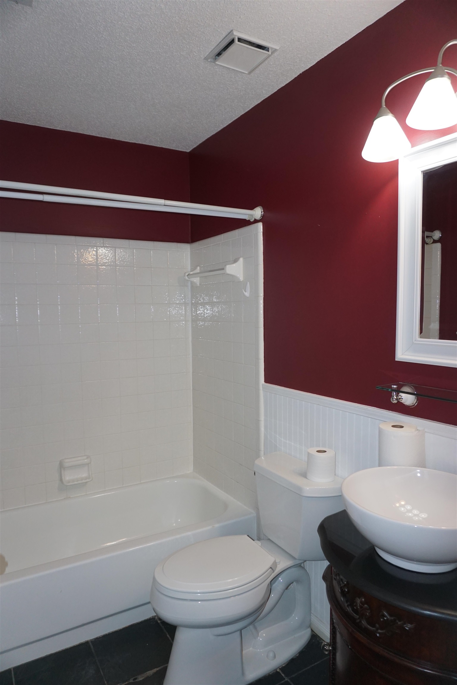 6320 Yale Road Bartlett, TN 38134 - Photo 11 of 25 a bathroom with a sink a toilet and shower
