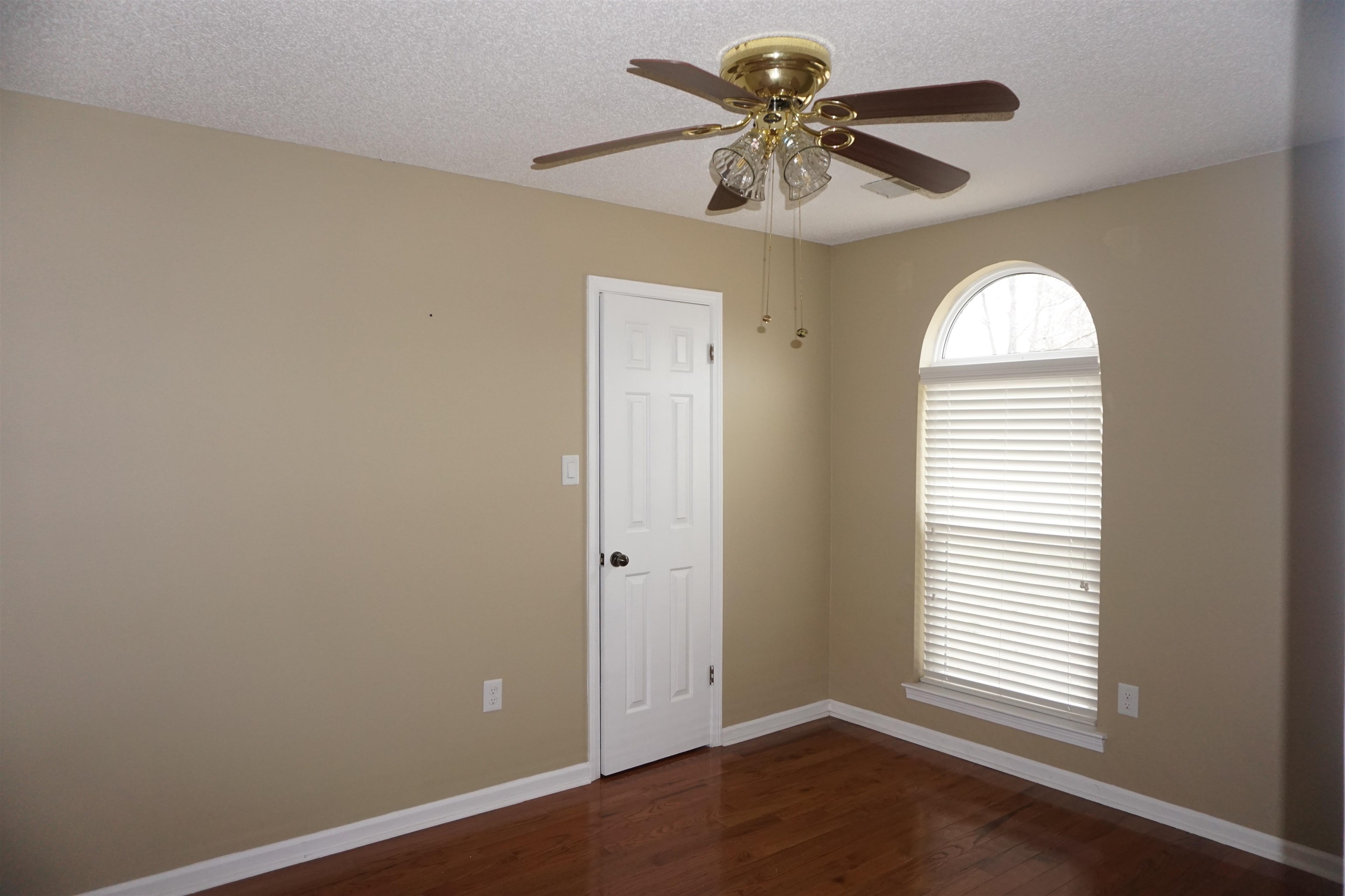 6320 Yale Road Bartlett, TN 38134 - Photo 12 of 25 wooden floor in an empty room with a window