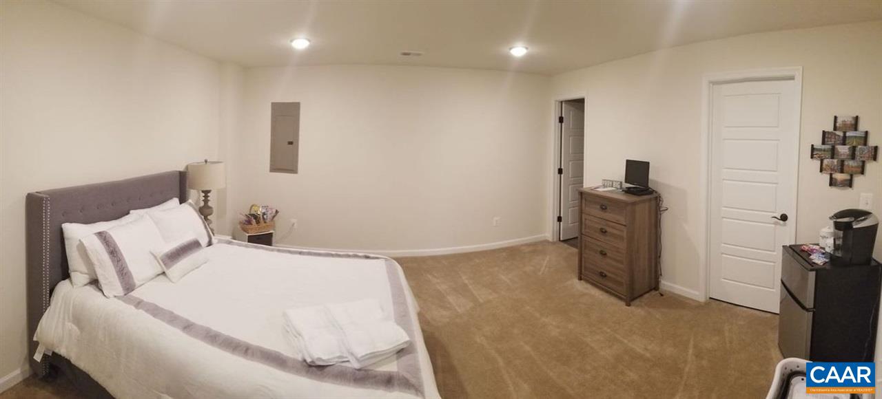 2180 Avinity Loop Charlottesville, VA 22902 - Photo 20 of 32 a large white bed in a white room