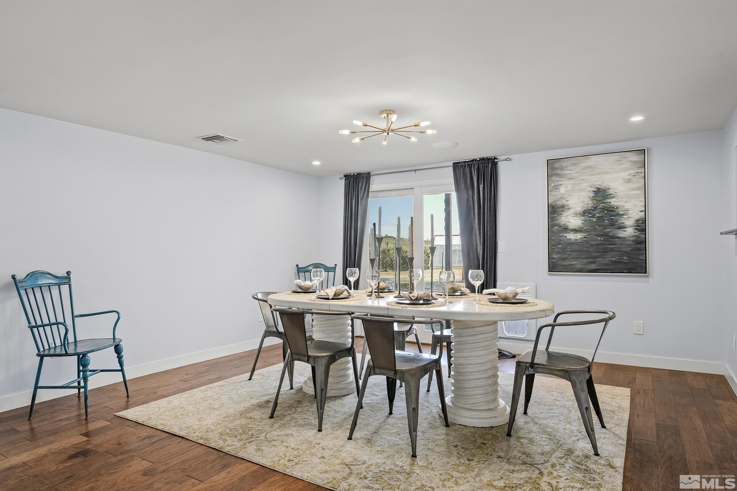 1045 Hoge Road Reno, NV 89506 - Photo 33 of 40 a view of a dining room with furniture