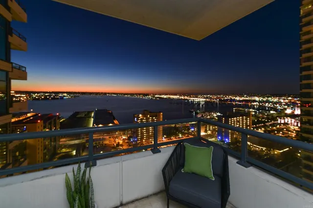 a view of a balcony with city view