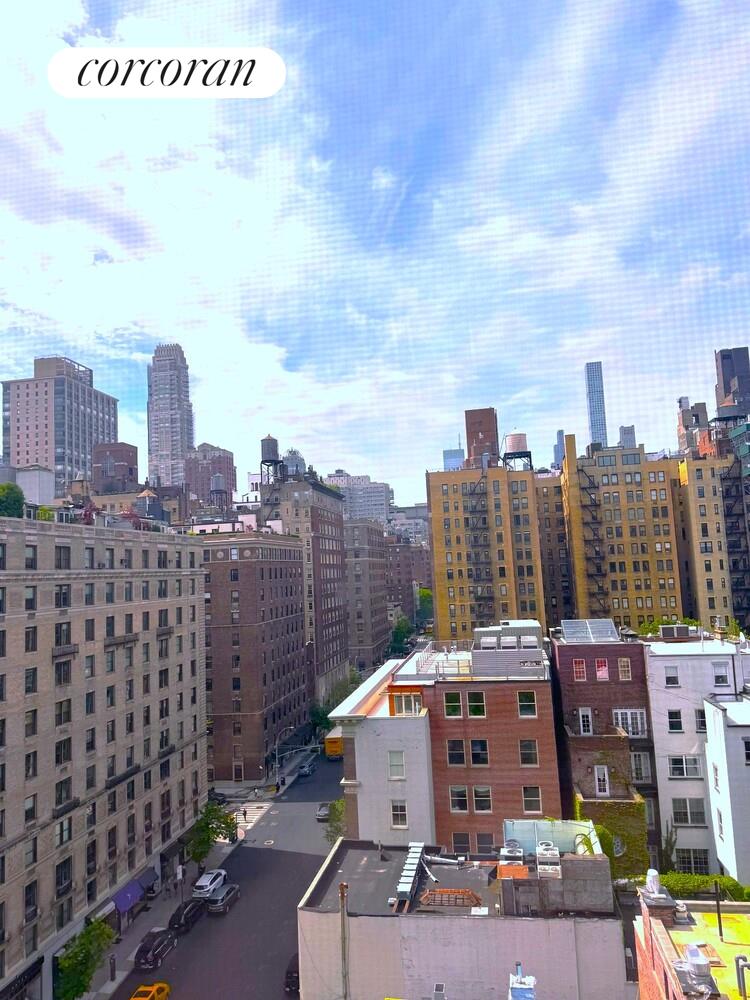 135 East 74th Street, Unit 11BC Manhattan, NY 10021 - Photo 11 of 13 a view of city with tall buildings