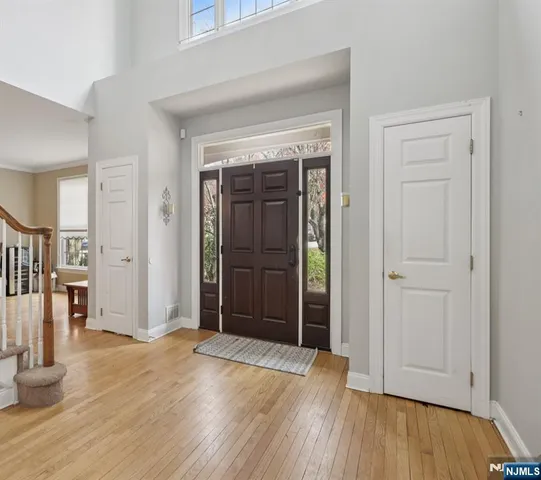 wooden floor with white walls