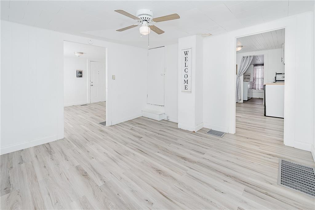 336 Walkchalk Road Kittanning, PA 16201 - Photo 18 of 49 wooden floor in an empty room with a window