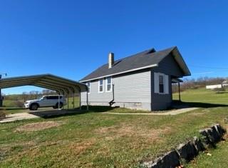 336 Walkchalk Road Kittanning, PA 16201 - Photo 8 of 49 a view of a house with a yard