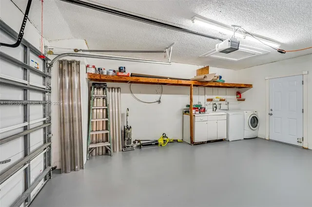 a view of a house with a small yard and a large window