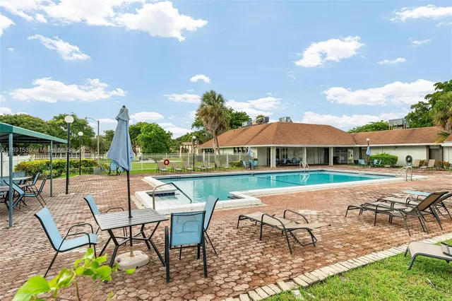 a view of a yard with plants