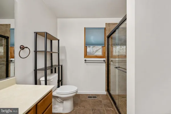 a backyard of a house with yard and garage