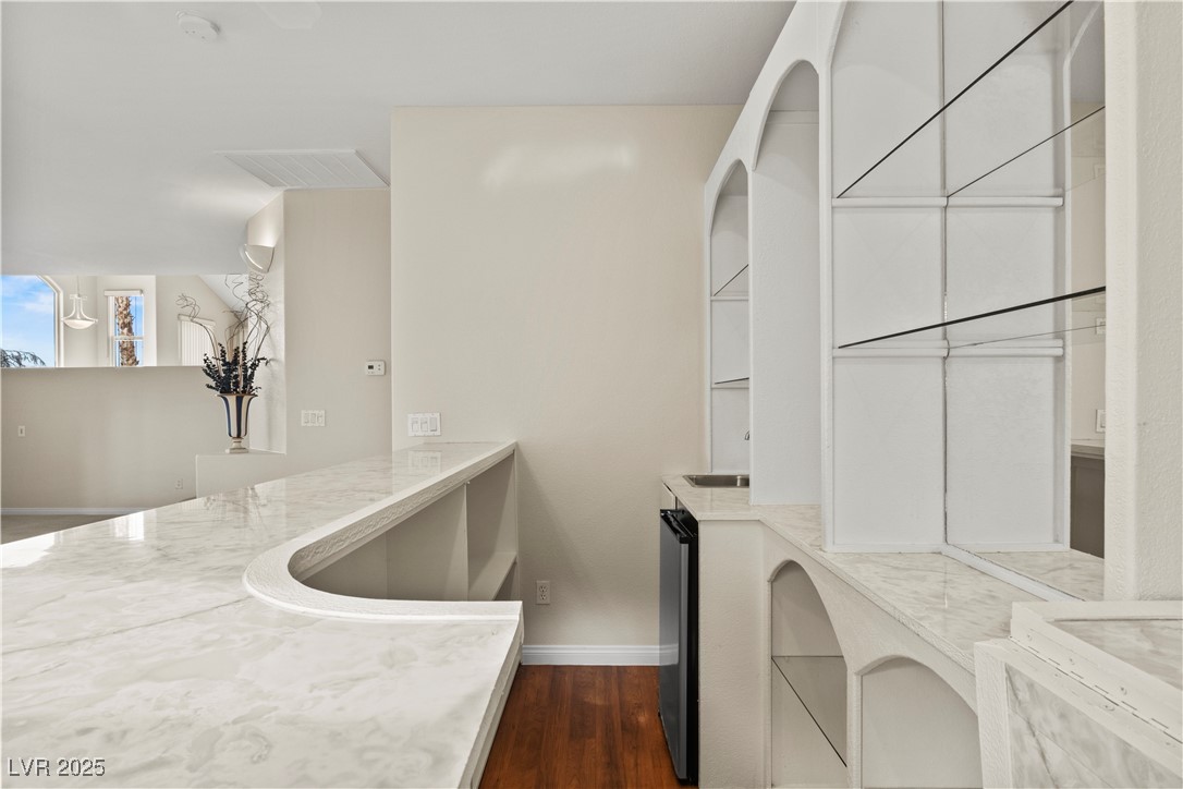 2576 Mizzoni Circle Henderson, NV 89052 - Photo 17 of 44 Built-in bar with lots of storage, mini fridge and sink