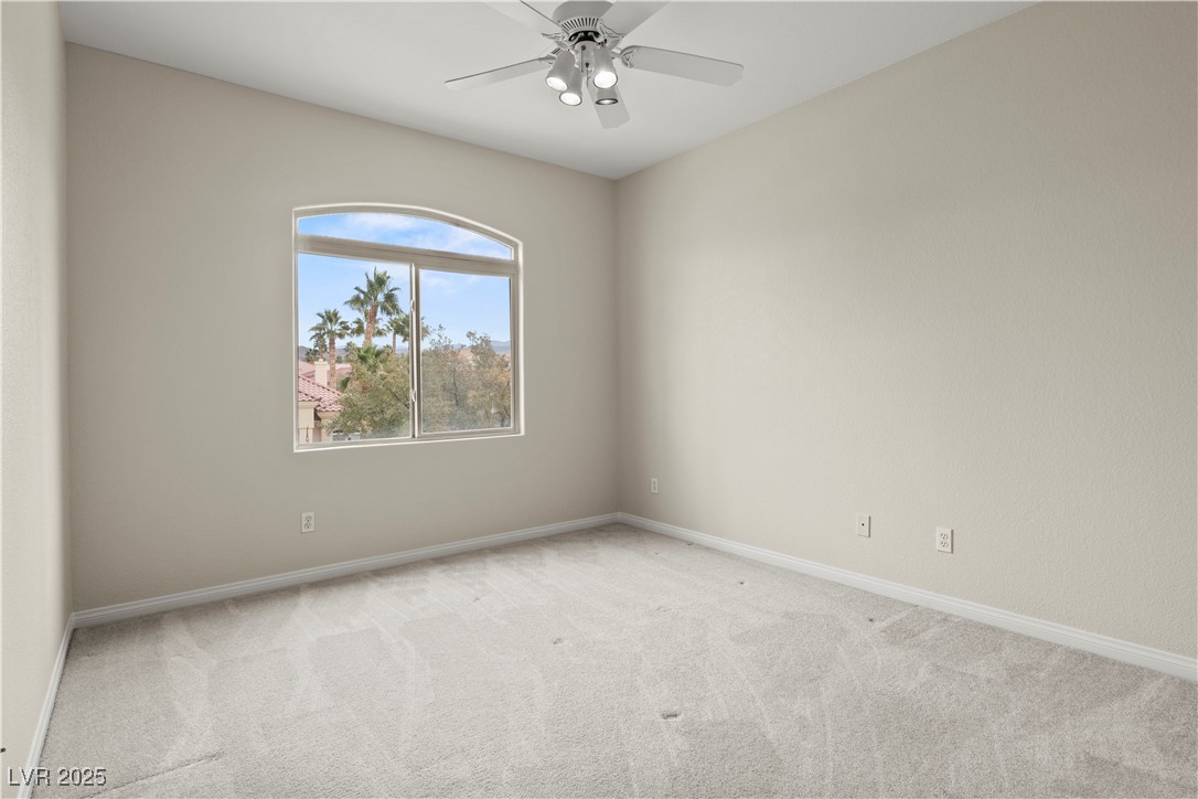 2576 Mizzoni Circle Henderson, NV 89052 - Photo 35 of 44 Bedroom 3 has a ceiling fan and walk-in closet