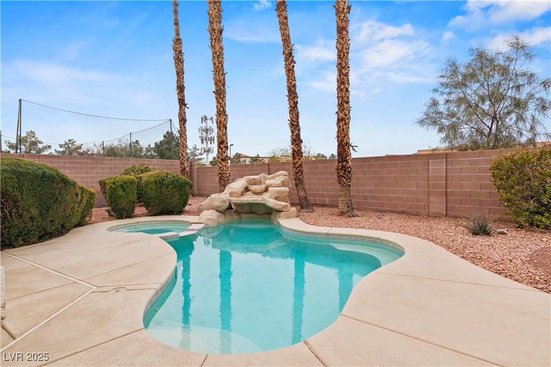 2576 Mizzoni Circle Henderson, NV 89052 - Photo 38 of 44 Pool, spa and waterfall