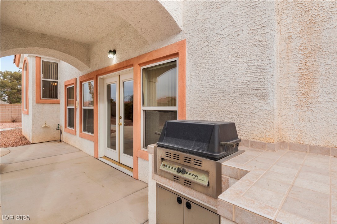 2576 Mizzoni Circle Henderson, NV 89052 - Photo 41 of 44 Covered patio and built-in BBQ