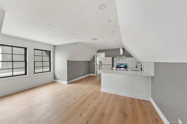 a view of a livingroom with a staircase