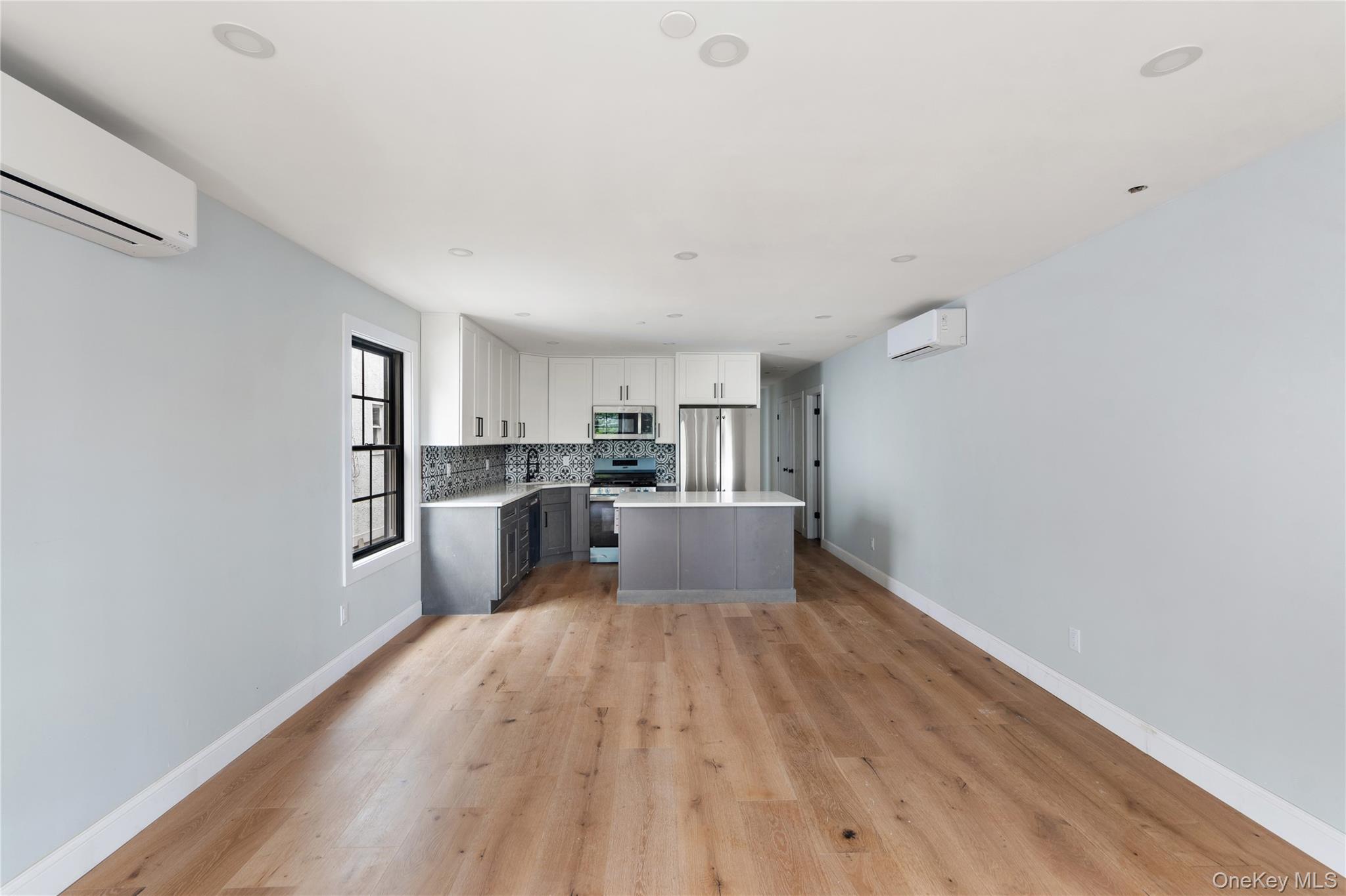 356 South 10th Avenue Mount Vernon, NY 10550 - Photo 28 of 30 a view of a kitchen with wooden floor