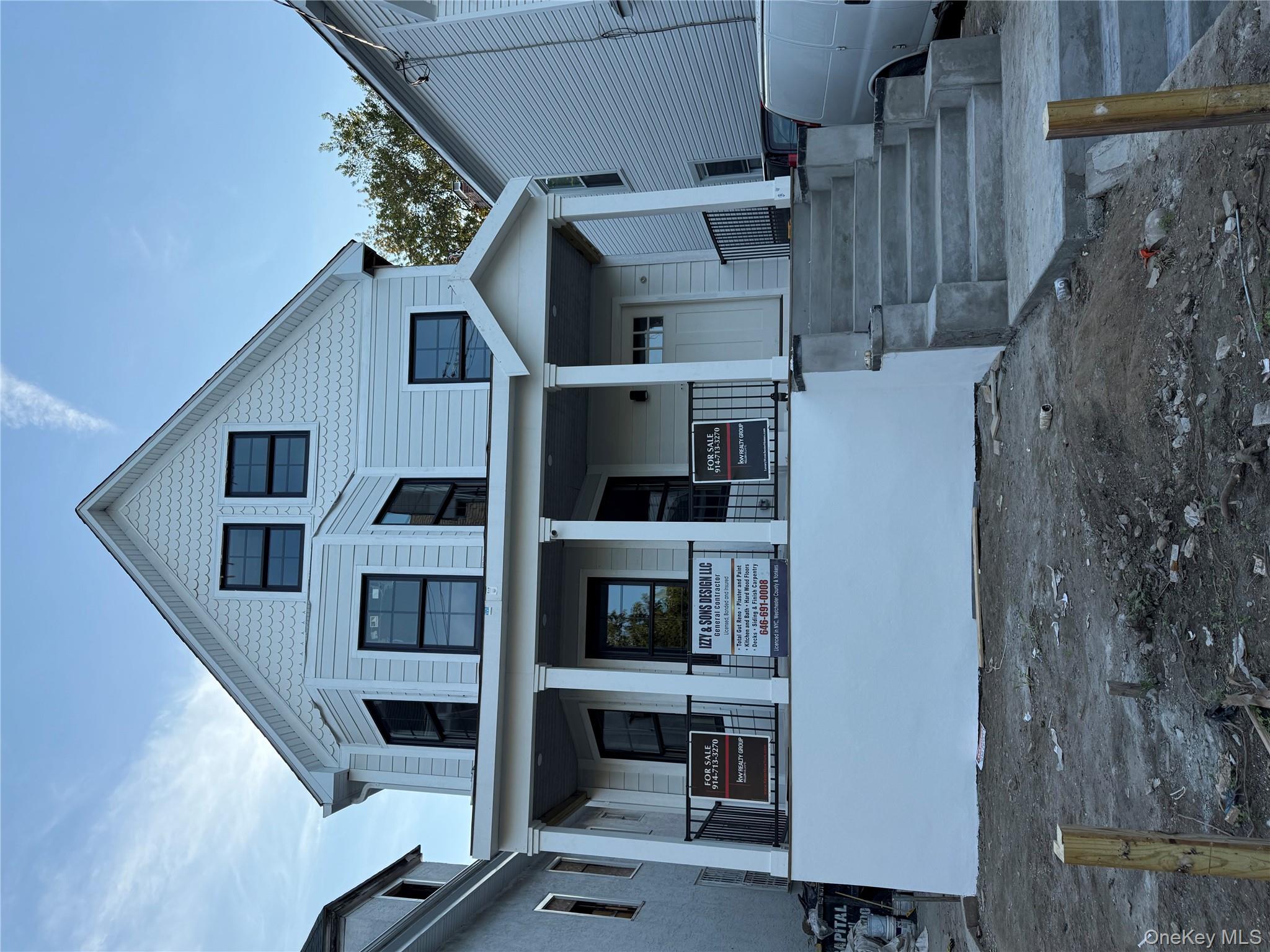 356 South 10th Avenue Mount Vernon, NY 10550 - Photo 29 of 30 a front view of a house with a yard