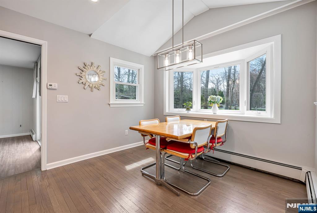 44 Deerfield Terrace Mahwah, NJ 07430 - Photo 13 of 42 a room with wooden floor and windows