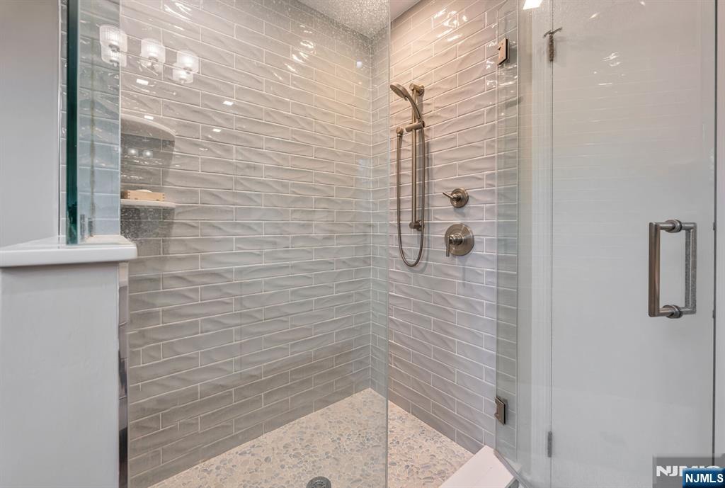 44 Deerfield Terrace Mahwah, NJ 07430 - Photo 28 of 42 a bathroom with a shower