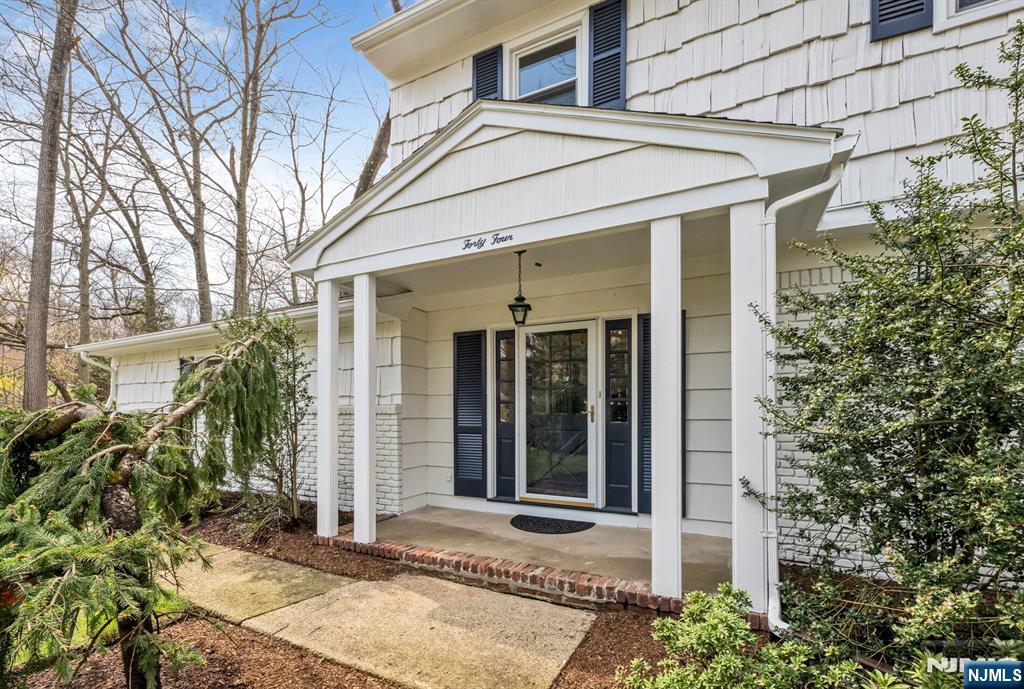 44 Deerfield Terrace Mahwah, NJ 07430 - Photo 4 of 42 front view of a house with a window